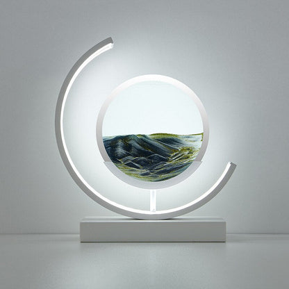 Modern acrylic LED table lamp | Unique rotating sand art bedside light 10